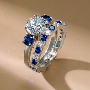 white & blue three stone round cut bridal set